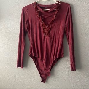 Charlotte Russe | Women’s wine red long sleeve Bodysuit Size M